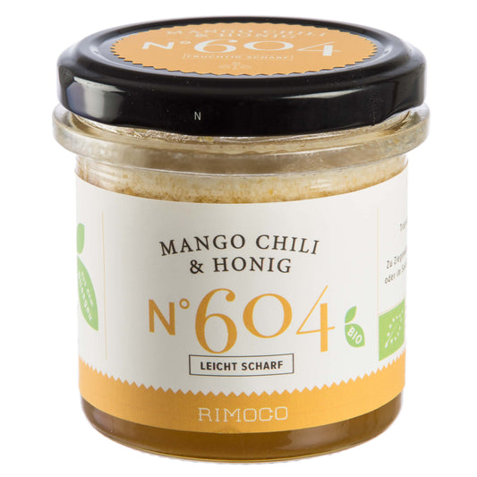 Mango, Chili & Honig Aufstrich im Glas mit Etikett leicht scharf.