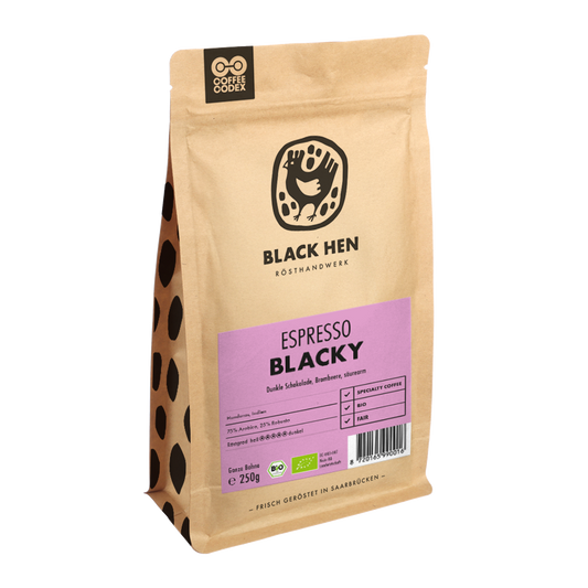 Bio Espresso BLACKY Kaffee in einer Tüte mit violettem Frontetikett.
