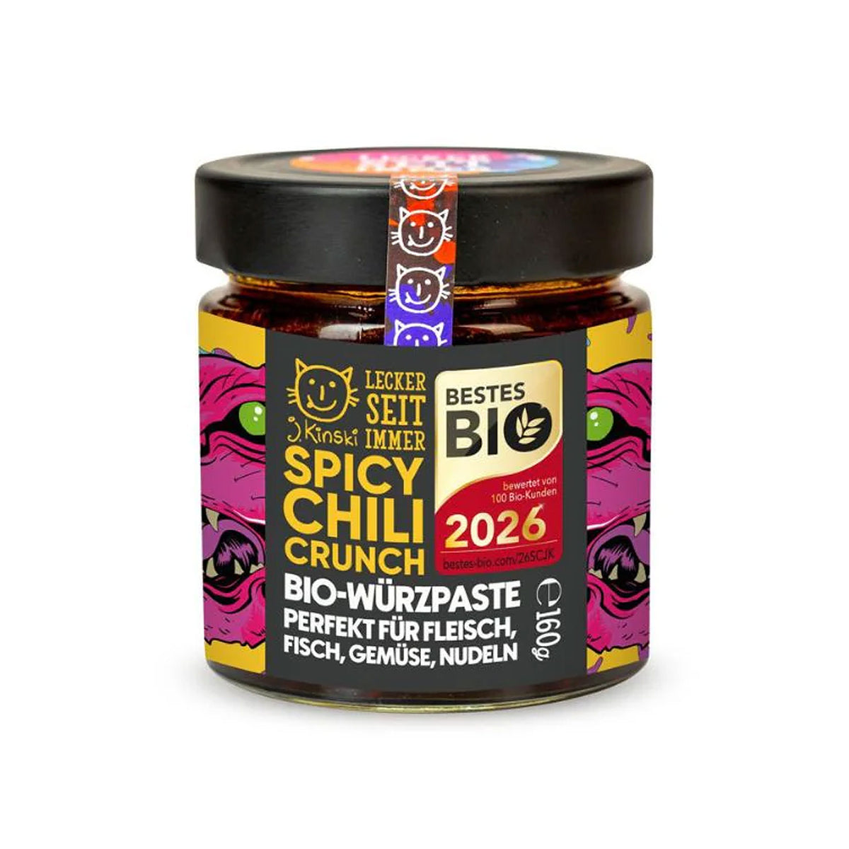 Bio Spicy Chili Crunch Glas mit bunter Katzenabbildung auf dem Etikett.