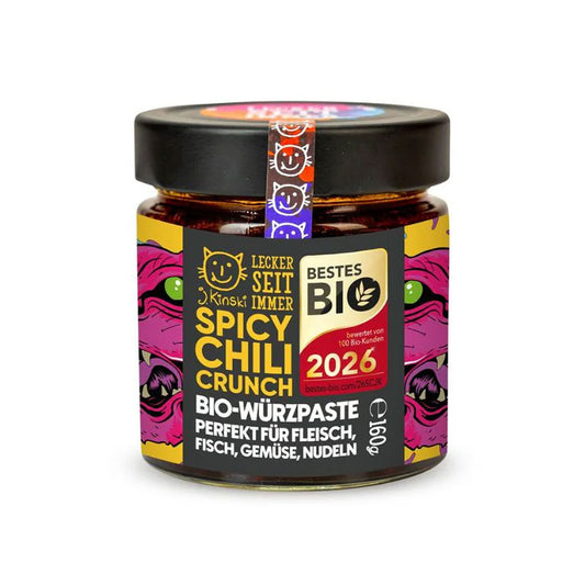 Bio Spicy Chili Crunch Glas mit bunter Katzenabbildung auf dem Etikett.