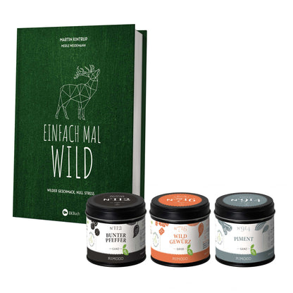 Einfach mal Wild: Grünes Kochbuch und drei Gewürzgläser mit verschiedenen Gewürzen für Wildgerichte.