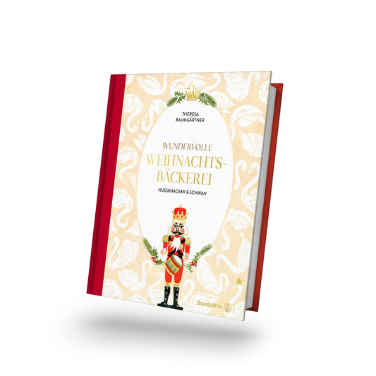 Backbuch Wundervolle Weihnachtsbäckerei mit Plätzchen auf festlich gestaltetem Einband.