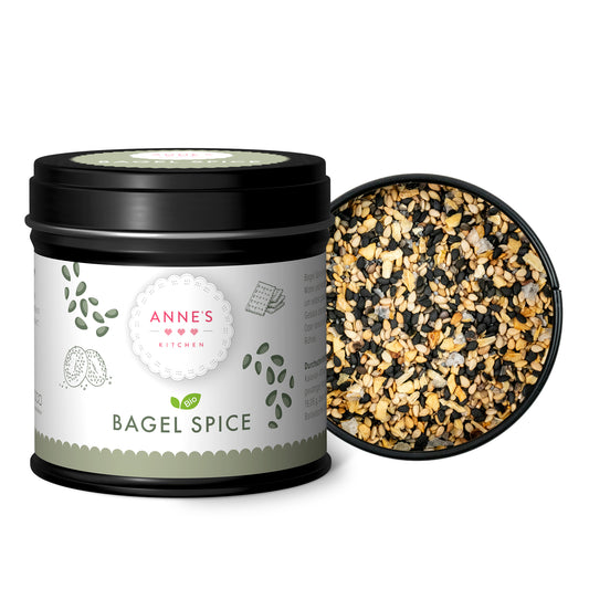 Dose mit Aufschrift Annes Bagel Spice geöffnet, innen grobe Gewürzmischung sichtbar.