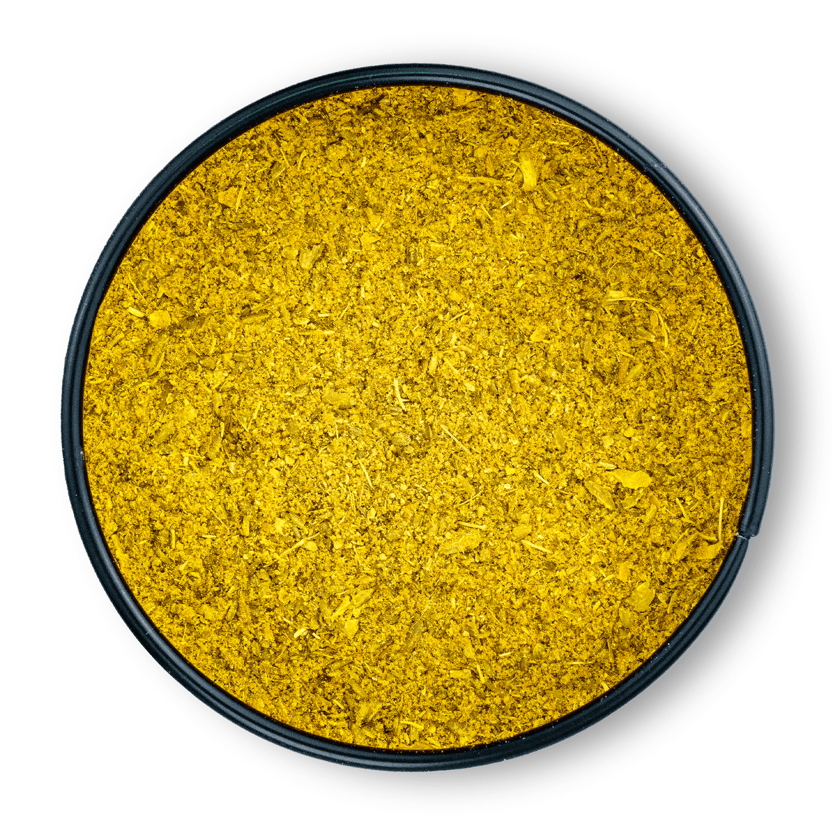 Fein gemahlenes gelbes Bio Ayurveda Dosha Pitta in einem runden schwarzen Behälter, von oben gesehen.