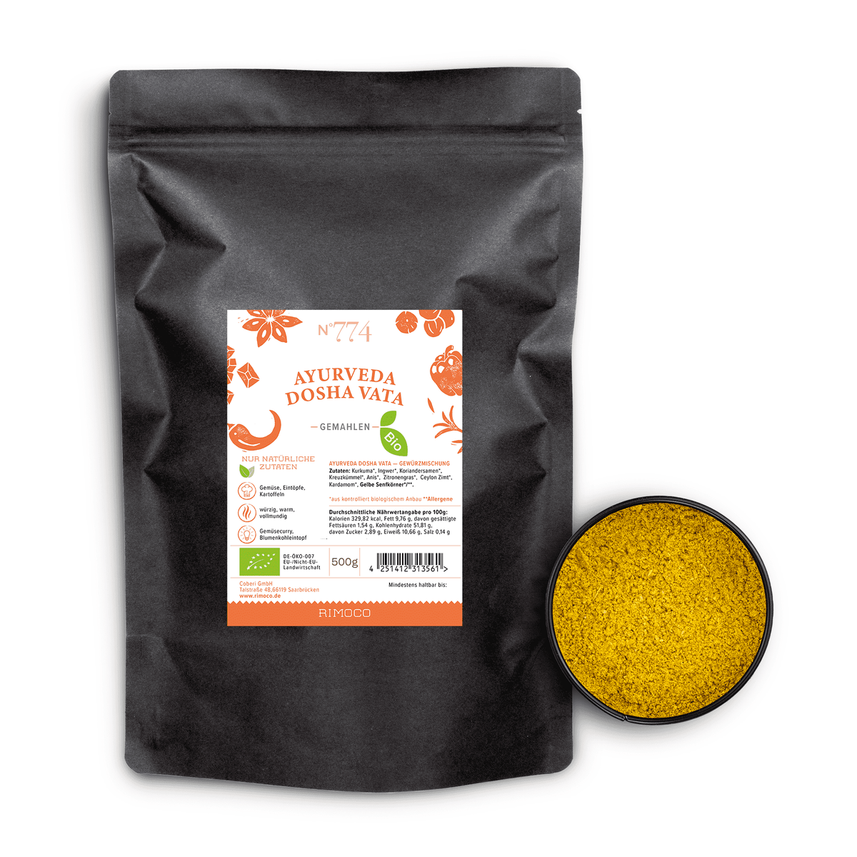 Schwarzer Beutel mit Aufschrift Bio Ayurveda Dosha Vata neben einer Schale mit gelbem Gewürzpulver.