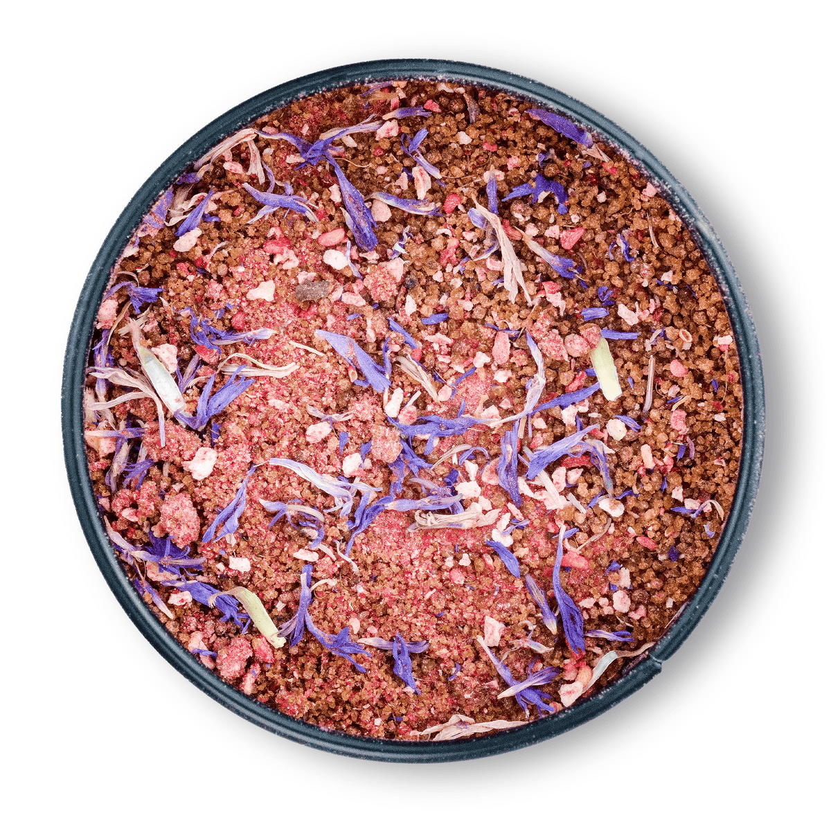 Bio Ayurveda Früchtetraum: Runddose mit rosa Fruchtpulver, darauf lila Blütenblätter.