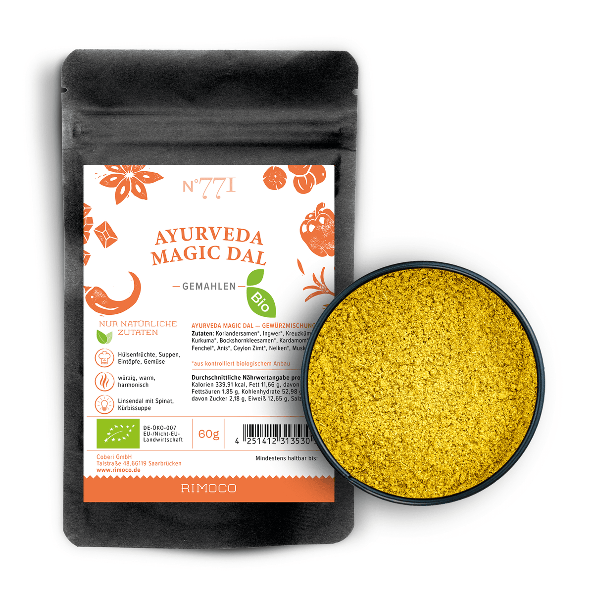 Schwarzer Beutel mit Aufschrift Bio Ayurveda Magic Dal neben einer Schale gelbes Gewürzpulver.