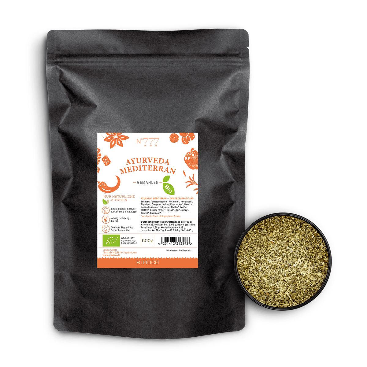 Bio Ayurveda Mediterran neben einer Schale mit italienischen Kräutern und frischen grünen Kräutern.