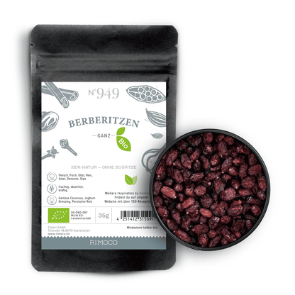 Schwarze Bio Berberitzen-Packung neben einer Schale mit getrockneten Berberitzen.
