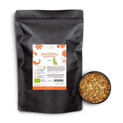 Schwarzer Beutel Bio Bolognese Gewürz neben einer Schale mit grobem italienischen Kräutermix.