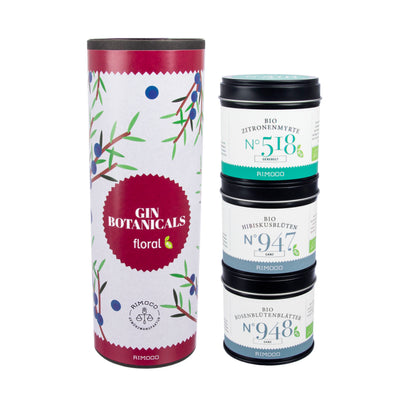 Bunter Zylinder mit Gin-Geschenkset, drei Dosen und sichtbarer Bio-Zitronenmyrte.