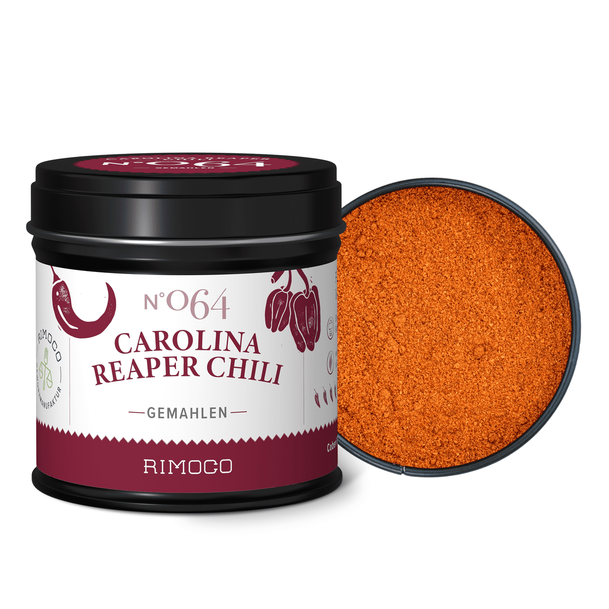 Carolina Reaper Chili im Glas mit geöffnetem Deckel, daneben orangefarbenes Chilipulver.