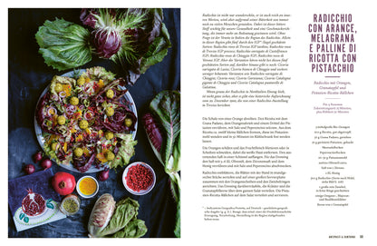 Bunter Salat mit Radicchio, Orangenscheiben, Granatapfelkernen und Ricottabällchen.