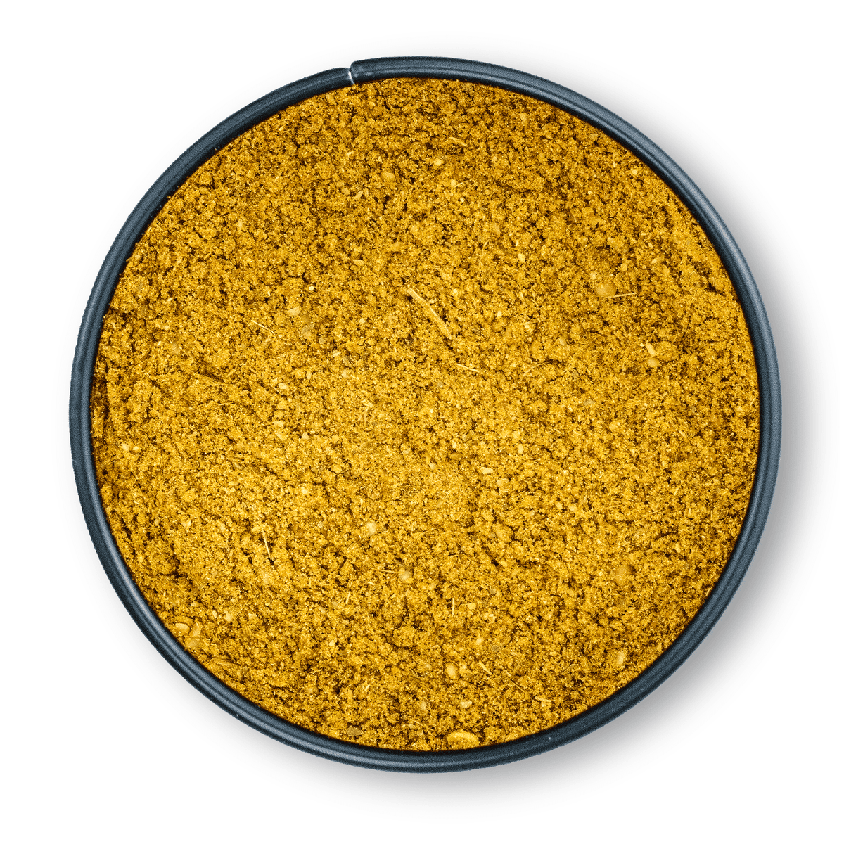 Gelbes, gemahlenes Garam Masala in einem runden, schwarzen Behälter von oben gesehen.