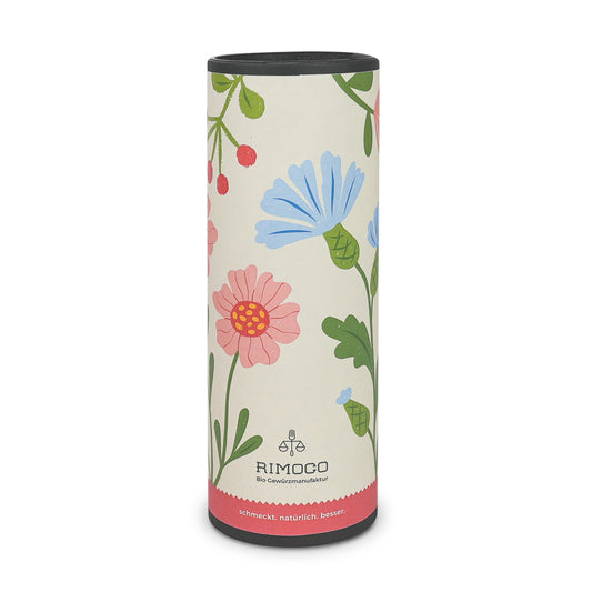 Geschenkverpackung mit buntem Blumenmuster für 3 Rimoco-Gewürze, Logo am unteren Rand sichtbar.
