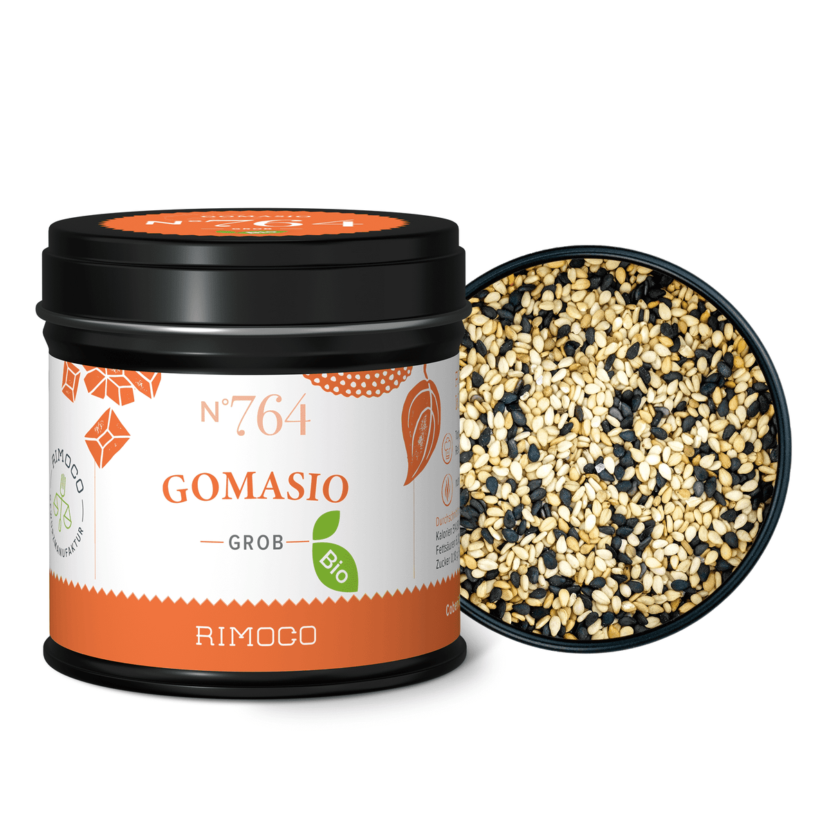 Geöffnete Dose mit Bio Gomasio, darin sichtbar eine Körnermischung aus schwarzem und weißem Sesamsalz.