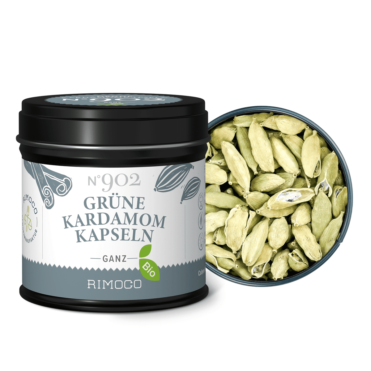 Offene Dose mit Aufschrift Bio Grüne Kardamomkapseln, daneben grüne Kardamomkapseln im Deckel.
