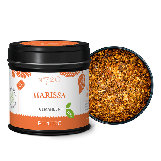 Bio Harissa Gewürz, geöffnete Dose mit sichtbar orange-roter marokkanischer Mischung.