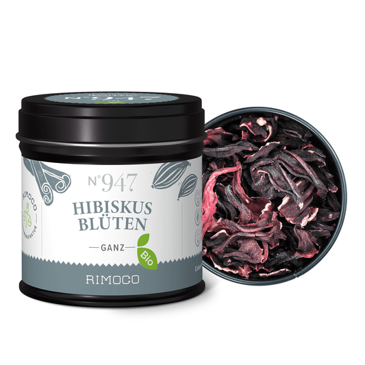 Schwarze Dose mit Aufschrift Bio Hibiskusblüten ganz, darin getrocknete Hibiskusblüten sichtbar.