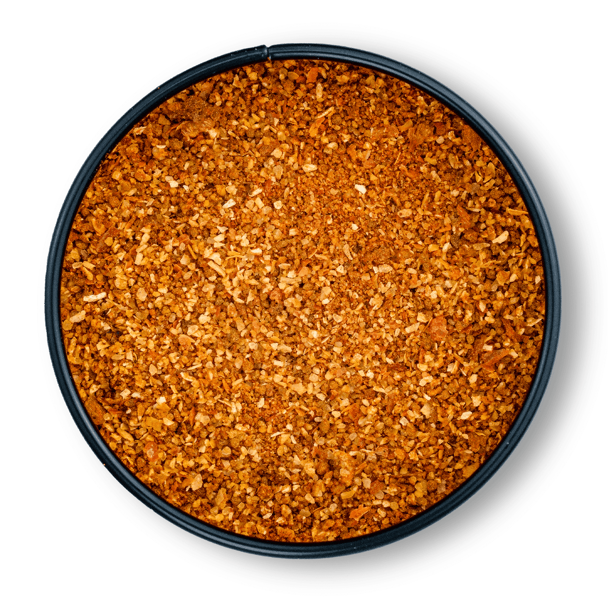 Runde Dose mit grobem, orange-braunem Bio Hot BBQ Rub von oben auf weißem Hintergrund.