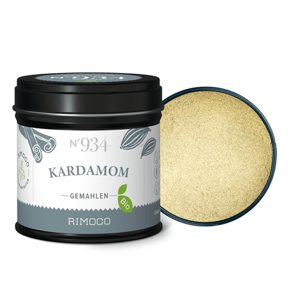 Bio Kardamom gemahlene Dosis, gefüllt mit grünem Kardamom, Deckel liegt daneben.