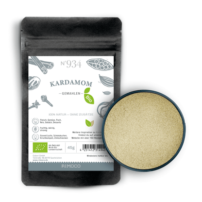 Bio Kardamom gemahlene Packung, daneben gemahlenes Kardamompulver in rundem Behälter.