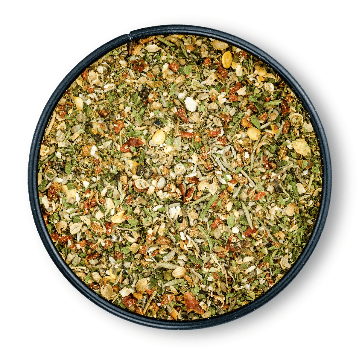 Runde Dose mit Bio Köfte Gewürz, bunte Mischung aus getrockneten orientalischen Kräutern und Gewürzen, Aufsicht.