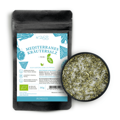 Schwarzer Beutel mit Bio Mediterranes Kräutersalz, daneben ein runder Salzbehälter.