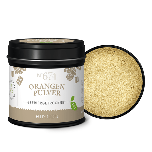 Offene schwarze Dose mit Bio Orangenpulver, innen leuchtendes orangefarbenes Pulver sichtbar.
