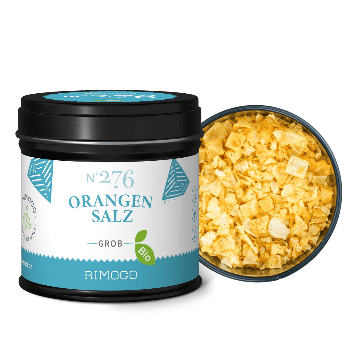 Schwarze Dose Bio Orangensalz mit abgenommenem Deckel, grobes oranges Salz im Inneren sichtbar.