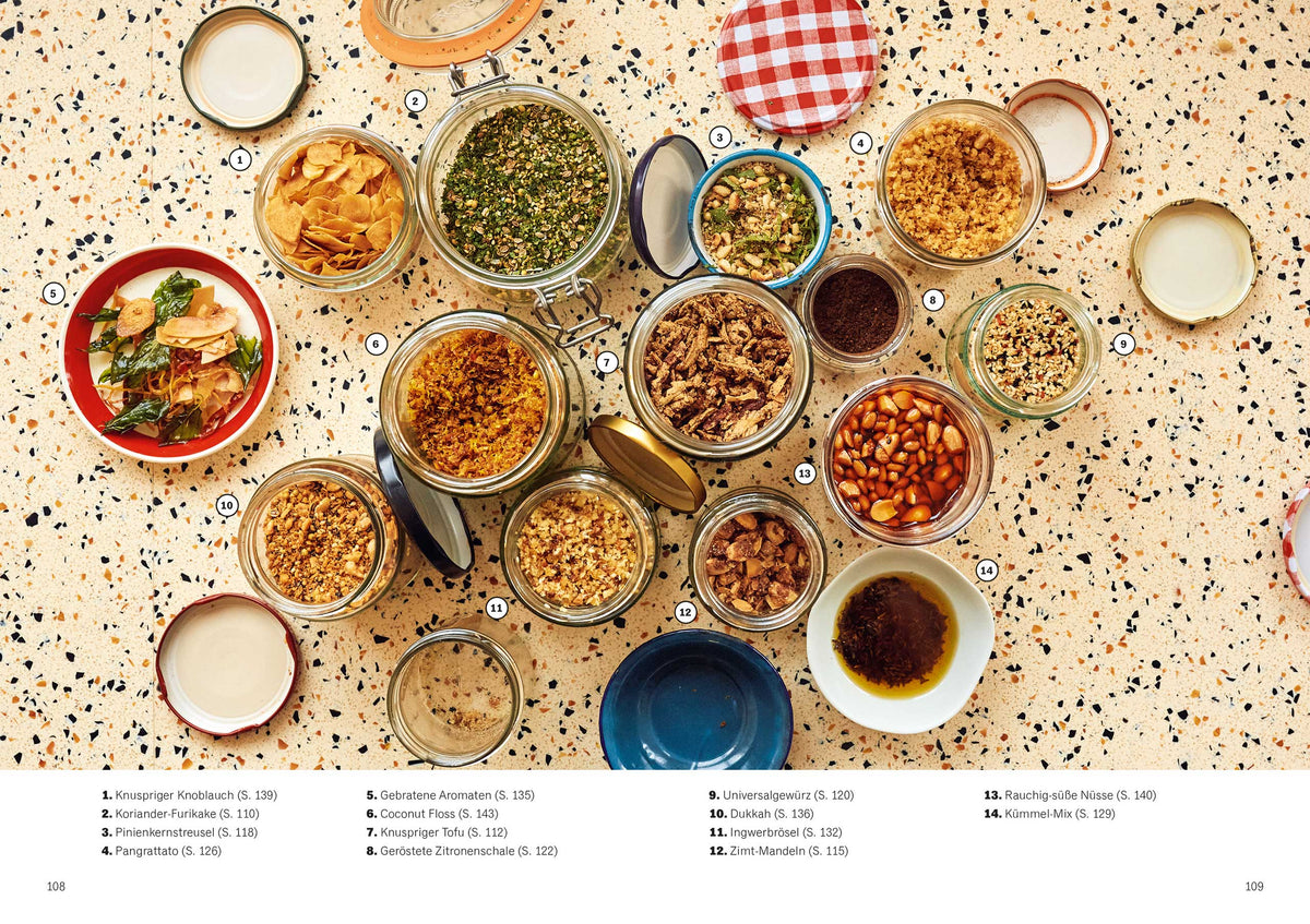 Ottolenghi Test Kitchen Extra Good Things: Gläser mit Etiketten auf gesprenkelter Arbeitsfläche.