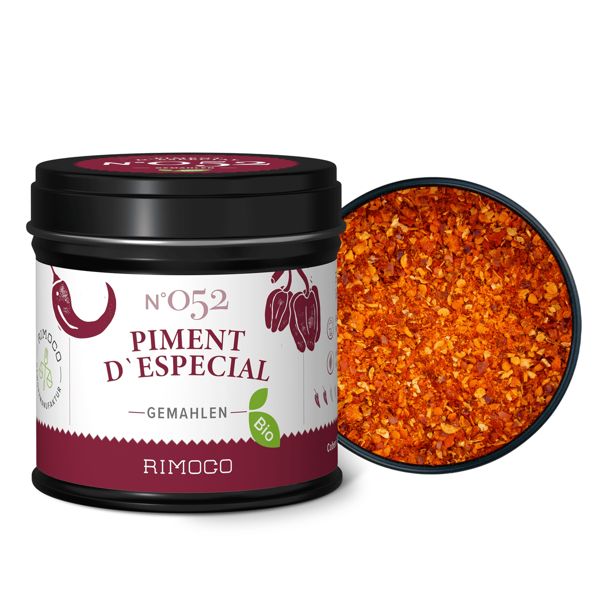 Dose Bio Piment dEspecial neben einer Schale mit leuchtend rotem, gemahlenem Gewürz.