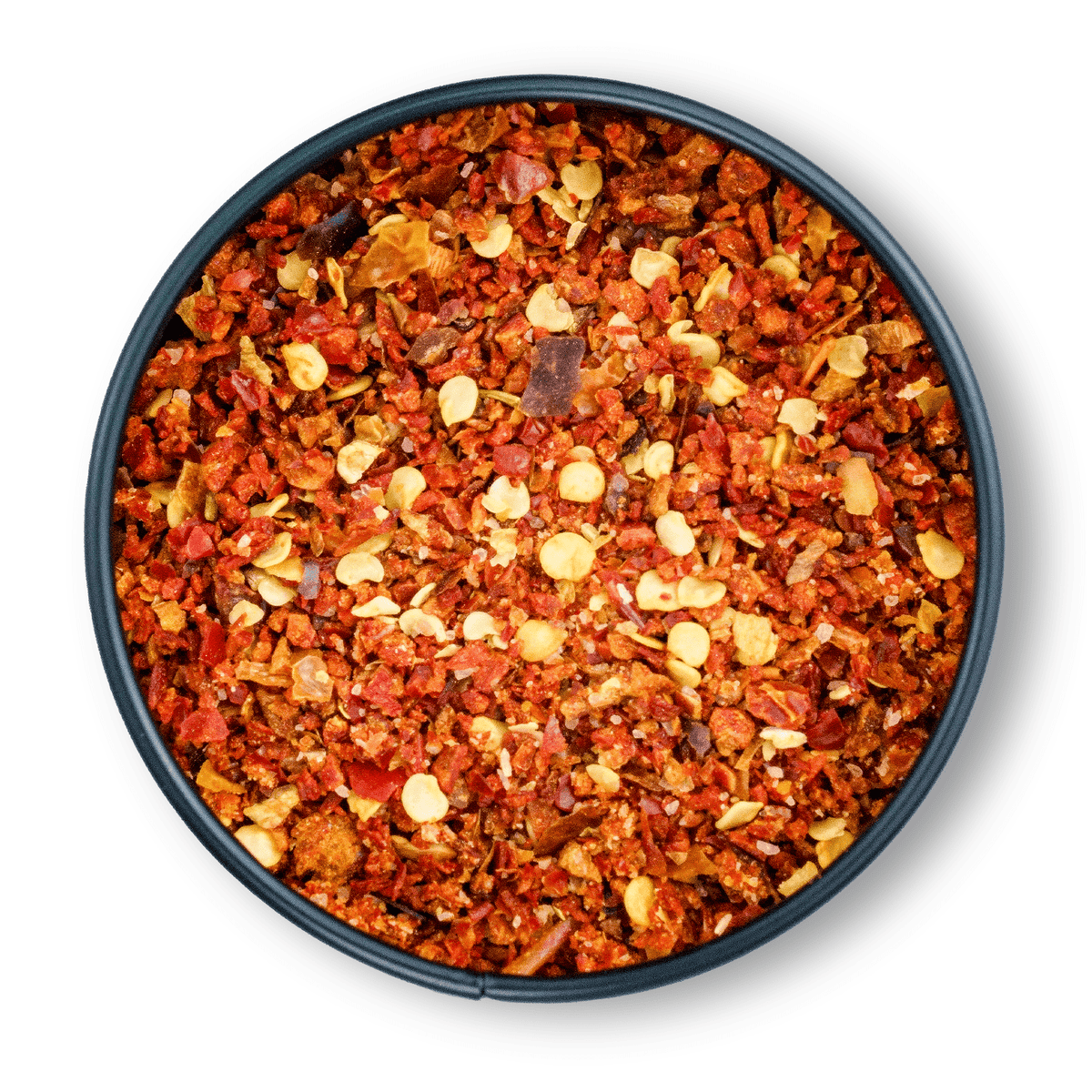 Bio Pul Biber in einer runden Dose von oben auf weißem Hintergrund.