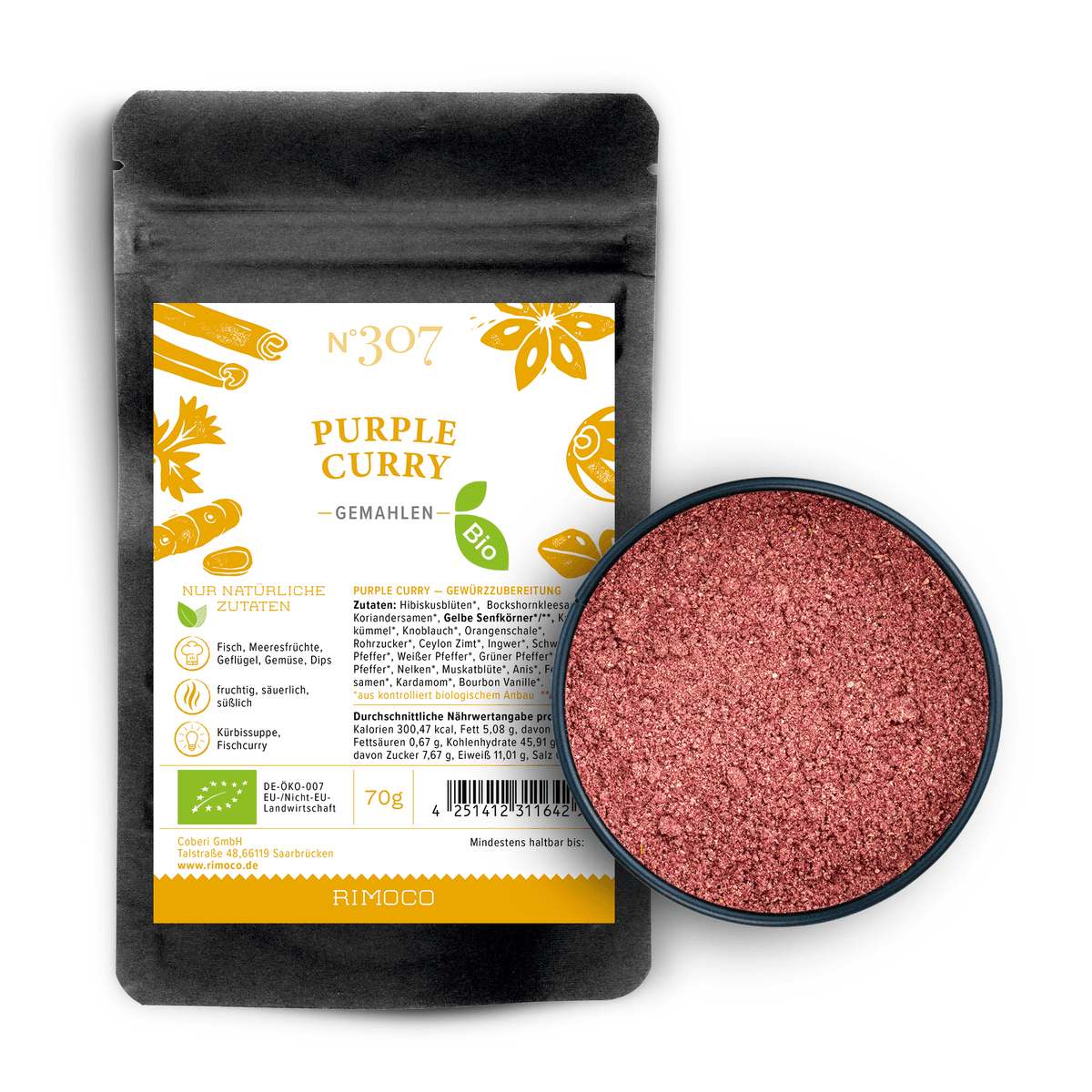 Bio Purple Curry neben einer Schale mit fein gemahlenem orientalischem Currypulver.
