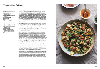 Ein Schüssel Kartoffelsalat mit frischen Kräutern.
