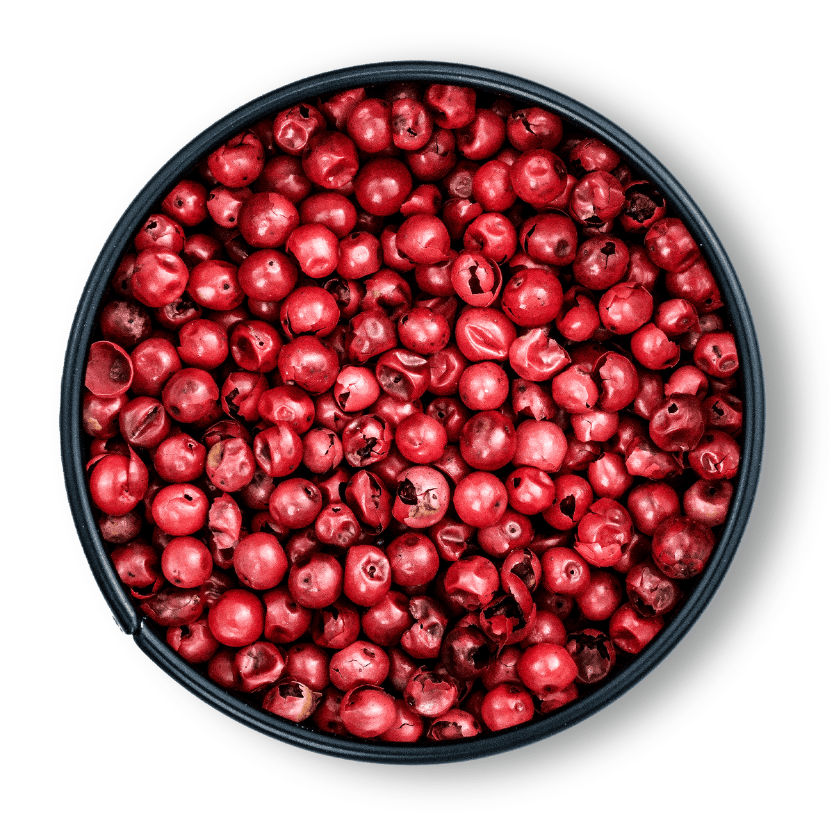 Schale mit Bio Rosa Pfeffer von oben auf weißem Hintergrund.