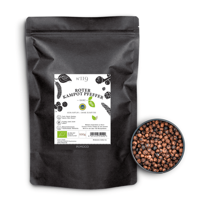 Bio Roter Kampot Pfeffer, schwarze Packung, daneben eine Schale mit rotem Pfeffer in Körnerform.