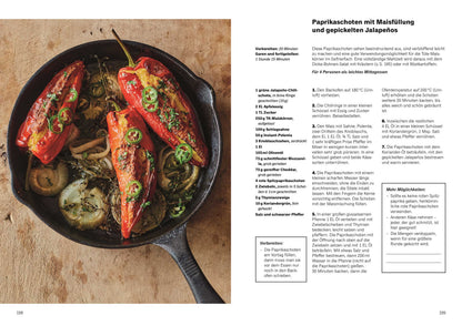 Gefüllte rote Paprika mit Zwiebeln und Kräutern, angerichtet auf einem Teller.