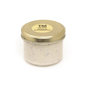 Trüffel Mayonnaise in kleinem Glas mit goldenem Deckel, cremige weiße Sauce sichtbar.