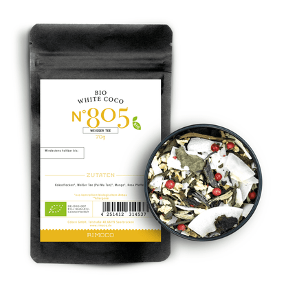 Schwarzer Beutel Bio Weisser Tee White Coco neben einer Schale mit Pai Mu Tan Mischung.