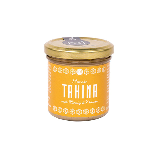 Yuvals Tahina Honig-Nuss im Glas mit gelbem Etikett und goldfarbenem Deckel.