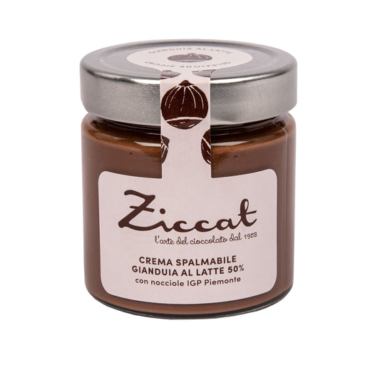 Haselnuss Creme von Ziccat in einem Glas mit silbernem Deckel und weißem Etikett.