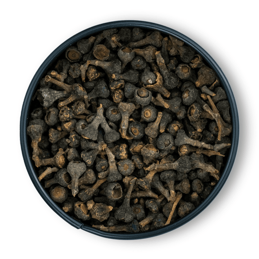Runde Dose mit Zimtblüten ganz, getrocknete dunkelbraune Stiele und Wurzeln von oben sichtbar.